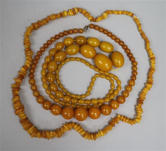 One amber necklace and two other simulated amber necklaces.
